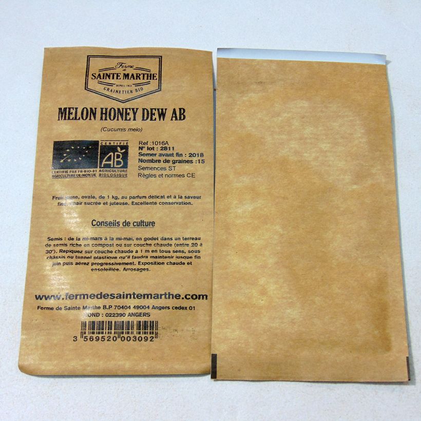 Beispiel eines Exemplars von Melone Honey Dew Bio - Ferme de Sainte Marthe die Tüte mit 15 Samen ungefähr wie geliefert