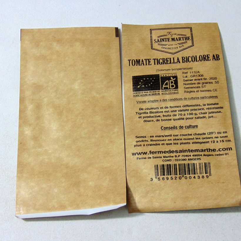 Beispiel eines Exemplars von Tomate Tigerella bicolore Bio die Tüte mit 50 Samen ungefähr wie geliefert